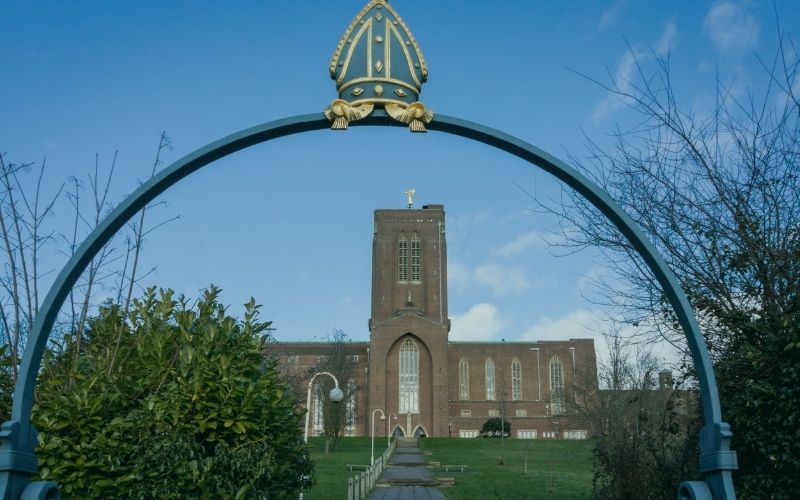 Guildford Cathedral on Stag Hill framed by the mitre arch