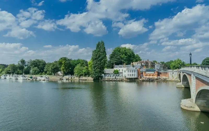 The Thames at Kingston Bridge, with boats moored along the riverside