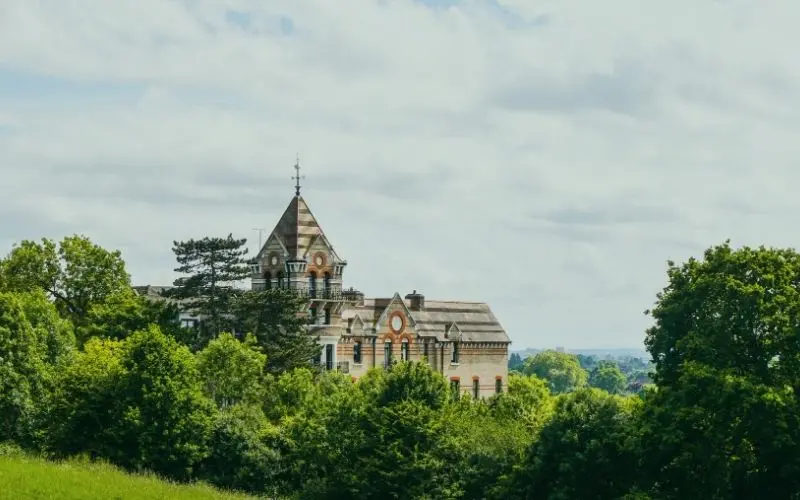 The Petersham Hotel's turret above the trees on Richmond Hill