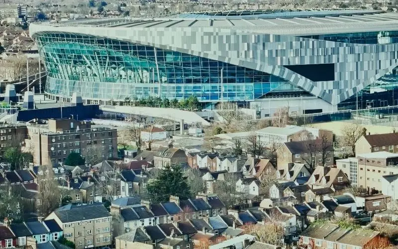 Tottenham Hotspur Stadium rising above the terraced streets of Tottenham