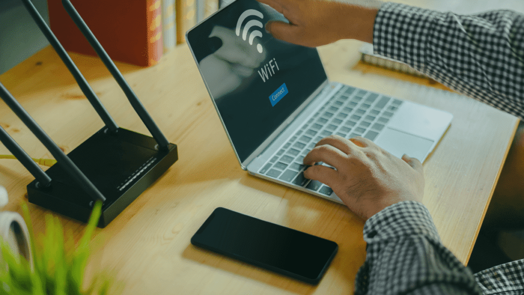 One Touch Switch broadband connection setup with laptop and WiFi router