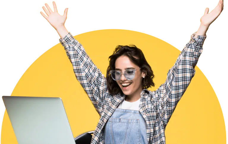 Home | Switchity Happy Woman With Her Arms Raised Browsing Deals On A Laptop