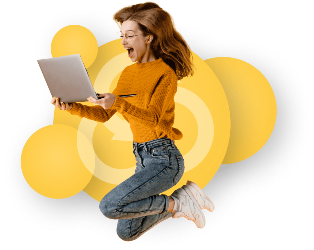 Woman Jumping With Joy With Her Laptop Browsing Broadband Deals
