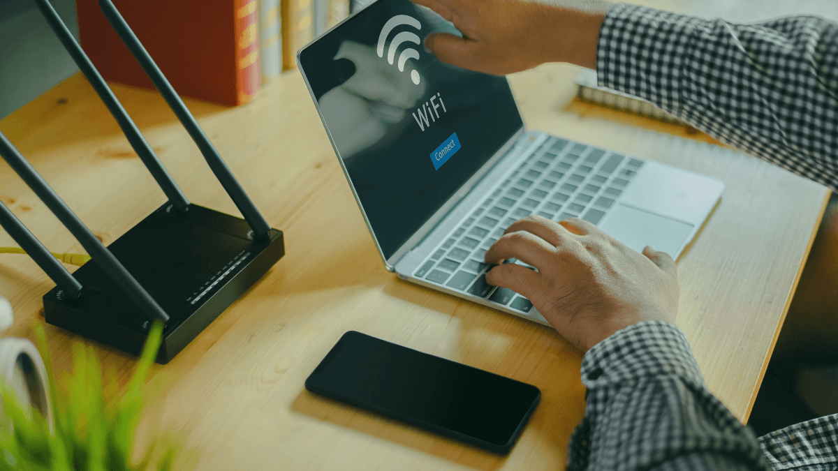 One Touch Switch broadband connection setup with laptop and WiFi router